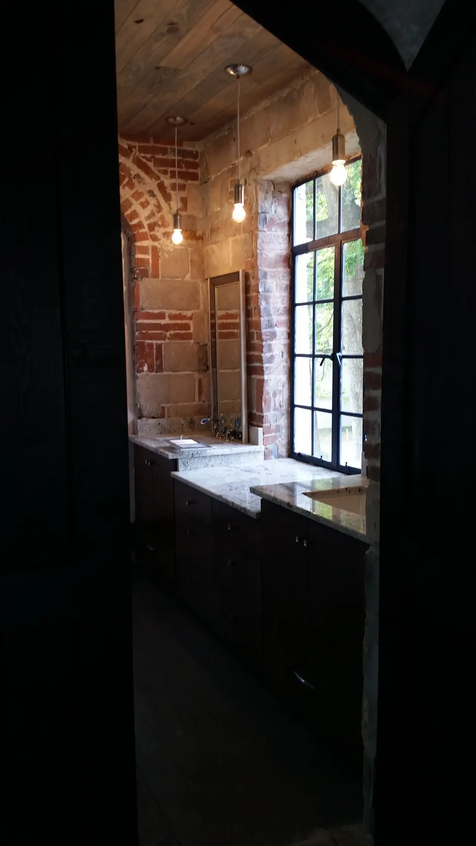 Custom multi-globe kitchen lighting in a historic Orlando building