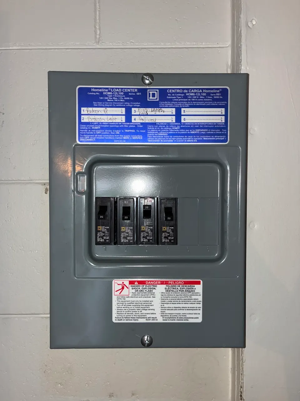 New electrical panel with labeled breakers