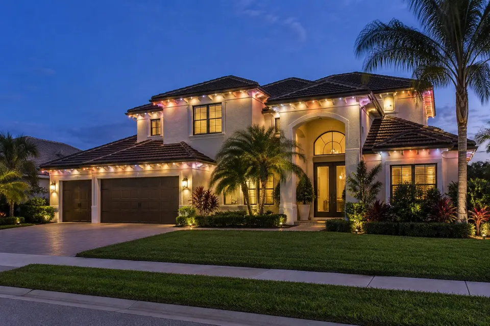 Warm white and color accents along a two-story roofline (illustration)