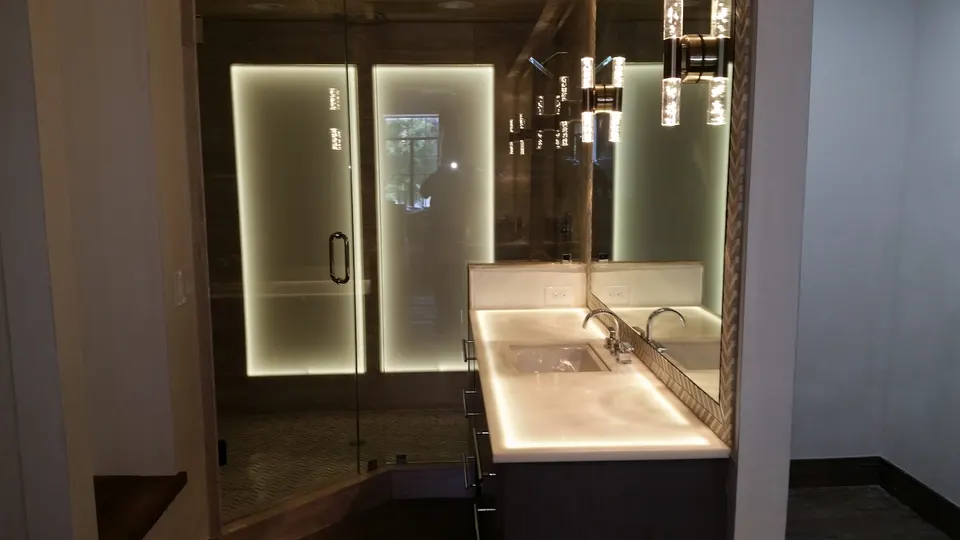 Custom backlit LED bathroom lighting installation, Orlando FL